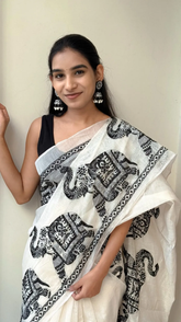 Women's Premium Pure Linen Cotton Saree | Traditional Madhubani Elephant Block Printed Casual Sari with Geometric Temple Border & Unstitched Blouse Piece | Luxury Lightweight Summer & Office Wear (Off-White & Charcoal Black)